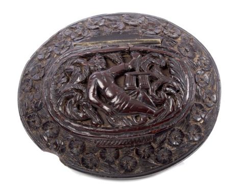 Rare 17th century Continental carved coconut snuff box of oval cushion form, the hinged cover relief carved with reclining ge