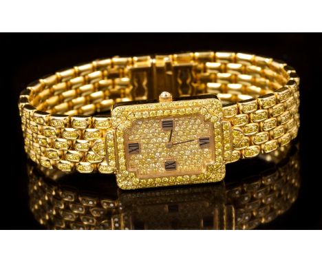 Fine yellow diamond wristwatch, by Graff, the pavé set yellow diamond rectangular dial with black enamel Roman numerals at th