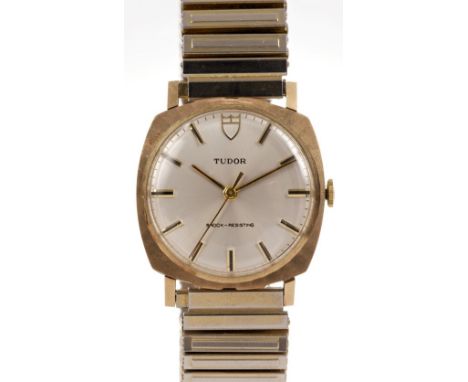 1970s gentlemen's Tudor gold (9ct) wristwatch with 'brushed' cushion-shaped case and silvered dial with baton numerals with g