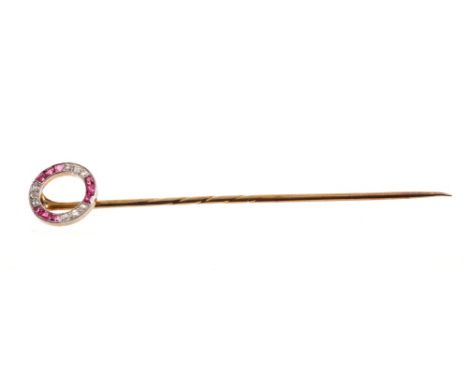 Edwardian ruby and diamond stick pin, the circular ring set with rose cut diamonds and calibre cut rubies in millegrain setti