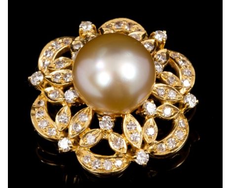 Cultured pearl and diamond pendant / brooch by Adler, the golden / champagne-coloured cultured button pearl measuring 12.05mm