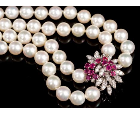 Cultured pearl necklace with ruby and diamond clasp, the double strand of one hundred and four cultured pearls measuring appr