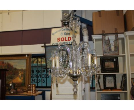 Early 20th century chandelier, having five scrolling branches issuing from central glass stem, 46cm high