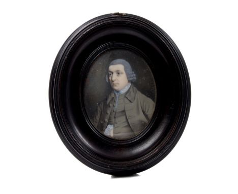 Late 18th century English School half-length miniature portrait on ivory of a gentleman in frock coat and wig, indistinctly n