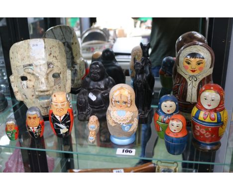 Collection of Russian Dolls and a Mexican Aztec design mask 