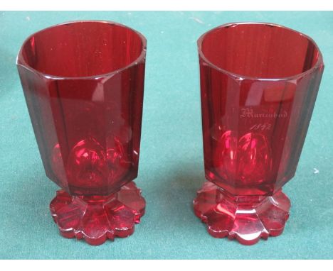 PAIR OF EARLY VICTORIAN RUBY COLOURED OCTAGONAL STEMMED GLASSES (AT FAULT), APPROXIMATELY 15cm HIGH