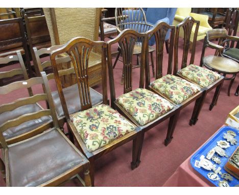 A Set of Four Early XX Century Stained Mahogany Dining Chairs, with pierced splat's, drop in seats, on tapering legs, spade f
