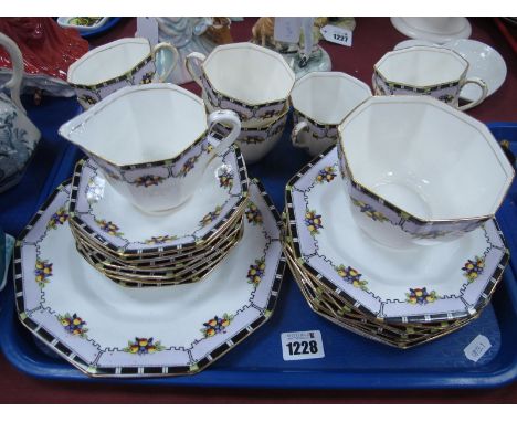 An Early XX Century "Delphine" Tea Service,of twenty four pieces,  cups, saucers, cake plate, etc:- One Tray