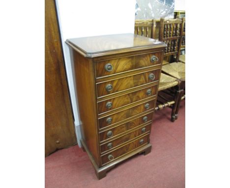 Bevan Funnell Reprodux Mahogany Music Cabinet, with seven drop front drawers, on bracket feet, each containing classical shee