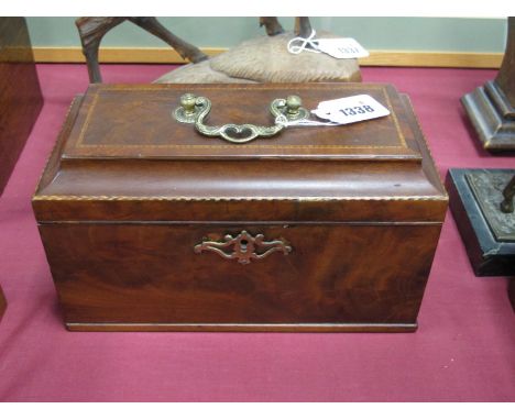An XVIII Century Mahogany Tea Caddy, with a brass handle, inlaid decoration internally with three divisions, 25.5cm wide.