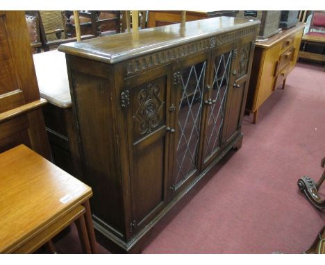 Reprodux Oak Side Cabinet, with knulled decoration, twin glazed leaded doors, side cabinets, on bracket feet, 135cm wide