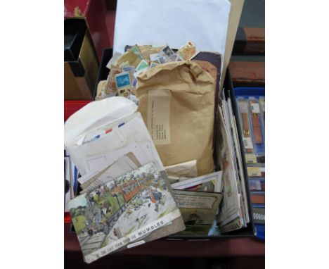 A Small Box of Used GB Stamps, mainly on paper, a junior album of World stamps and old post cards.