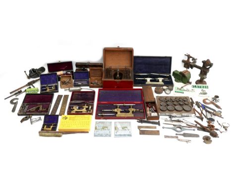 A collection of 19th and 20th century jewellers and watch maker's tools, including a Rolex opener, size 10.5, miniature brass