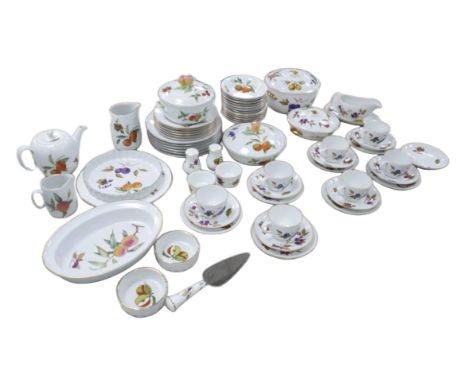 A Royal Worcester Evesham pattern part dinner service, with over sixty pieces, including a teapot, six trios, four lidded cas