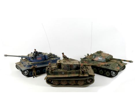 Three model WWII German tanks, two 1/16 scale HengLong radio controlled tanks, a/f missing controllers, and a third display m