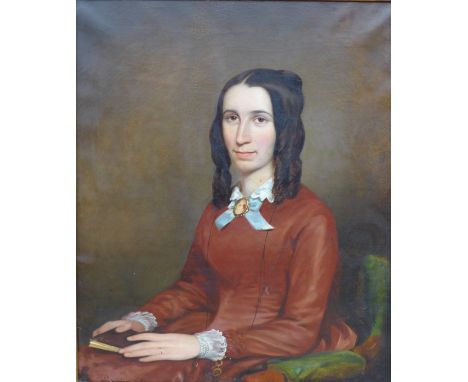 British School (19th century): a half length portrait of a woman, in a red dress, holding a book, oil on canvas, unsigned, 73