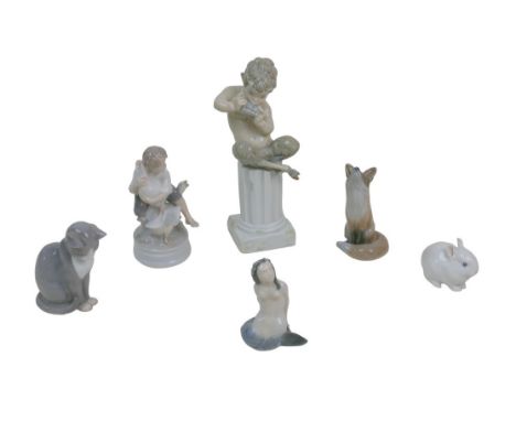 Four Royal Copenhagen figurines, comprising a mermaid (3321), 11cm high, a fox (1475), 14cm high, a bunny (4705),  a boy with