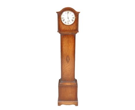 A mid 20th century Grandmother clock, with key, pendulum, 30 by 18.5 by 144cm high.