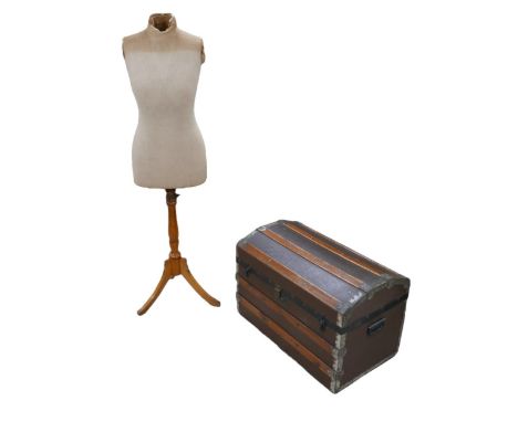 A mid 20th century mannequin, 149cm high, and a mid 20th century domed top trunk, 71 by 43 by 49cm high. (2) 