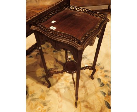 Walnut square table with carved frieze and circular shelf below 39 x 39 x 76 cm H