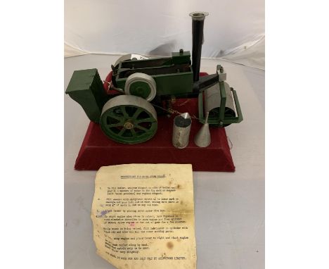 A VINTAGE SELFRIDGES LTD MODEL STEAM ROLLER  WITH MINI FUNNEL, JUG AND INSTRUCTION SHEET - MODEL IS INCOMPLETE AND REQUIRES A
