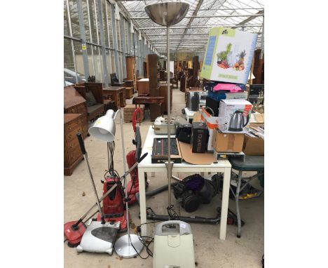 A KARCHER VAPORAPID AND AN UPRIGHT LAMP 