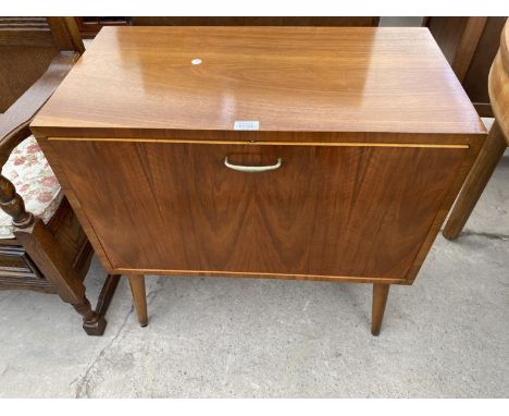 A VINTAGE WALNUT RECORD CABINET ON TAPERED LEGS, 28" WIDE 