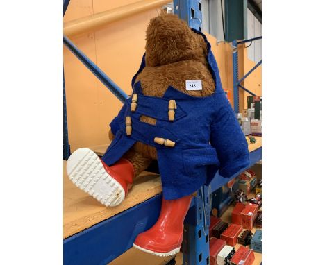 A LARGE VINTAGE PADDINGTON BEAR COMPLETE WITH WELLIES AND COAT 