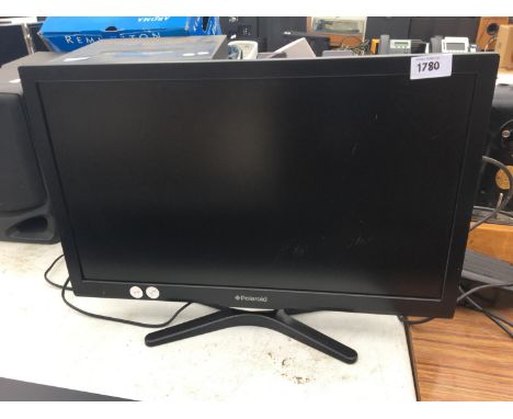 A 23 INCH POLAROID LCD TELEVISION BELIEVED TO BE IN WORKING ORDER BUT NO WARRANTY 