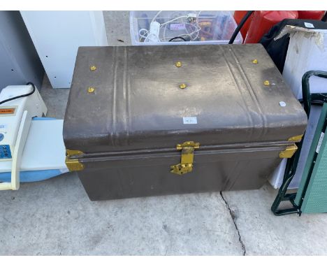 A VINTAGE TIN TRUNK 