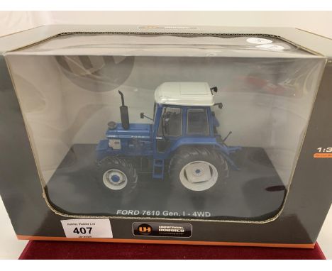 A BOXED SCALE MODEL OF A UNIVERSAL HOBBIES FORD TW-30 4X4 