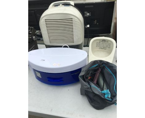 A DELONGHI DEHUMIDIFIER, A GERMEX BRUSH AND COMB SANITISER ETC BELIEVED TO BE IN WORKING ORDER BUT NO WARRANTY ALSO TO INCLUD