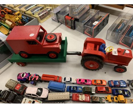 A WOODEN TRACTOR, TRAILER AND LAND ROVER 