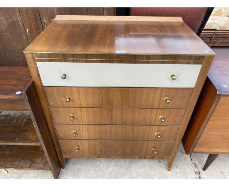 A VINTAGE TEAK CHEST OF FIVE DRAWERS 