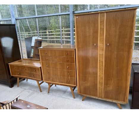 A VINTAGE WALNUT THREE PIECE BEDROOM SUITE COMPRISING TWO DOOR WARDROBE, FIVE DRAWER CHEST AND DRESSING TABLE WITH INVERTED F