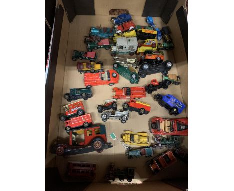 AN ASSORTMENT OF DIECAST VINTAGE CARS AND VANS 