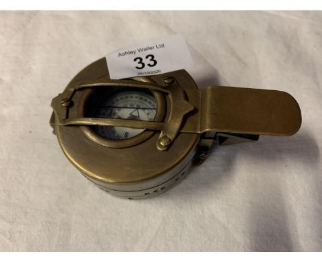 A VINTAGE GERMAN BRASS COMPASS 