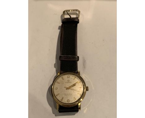 A TISSOT AUTOMATIC SEASTAR WRIST WATCH IN WORKING ORDER 