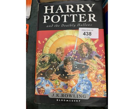 A FIRST EDITION COPY OF 'HARRY POTTER AND THE DEATHLY HALLOWS' BY J K ROWLING 