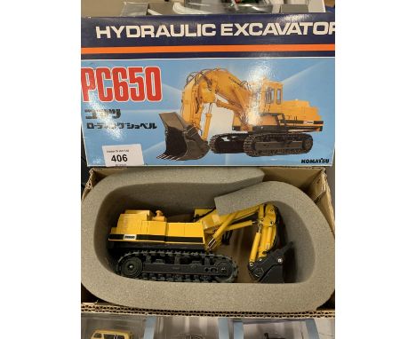 A KOMATSU 1:50 SCALE MODEL OF A PC650 HYDRAULIC EXCAVATER 
