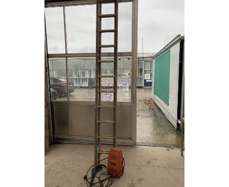 A POWER DEVIL PRESSURE WASHER AND A WOODEN EXTENDING LADDER WITH METAL RUNGS 