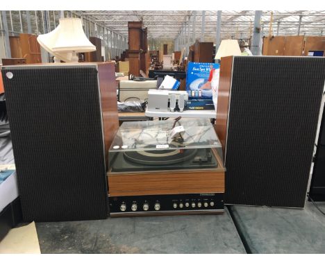 A GARRARD TURNTABLE AND LEAK SPEAKER BELIEVED IN WORKING ORDER BUT NO WARRANTY 