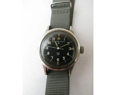 An IWC mark XI military wrist watch, issued by RAF in 1952. Original black tritium dial with ordnance arrow, luminous marks a