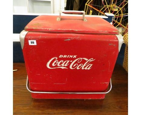 A 1930s/40s enamel cooler box with Coca Cola in white over red enamel and steel carry handle