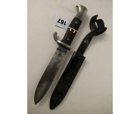 A late 1930s Hitler Youth dagger, enamel emblem to handle with leather holder and metal scabbard