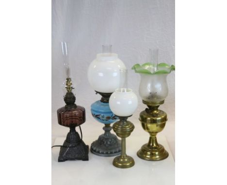 Three vintage Oil Lamps, one with painted blue Glass reservoir &amp; white Glass shade, one with Etched Glass shade plus anot