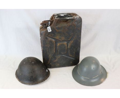 A World War Two British Jerry Can With The Broad Arrow Mark, Verso Overstamped With German Markings, Together With Two World 
