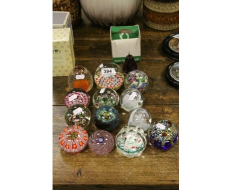 Quantity of glass paperweights to include Murano, Millefiori and Caithness etc
