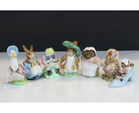 Six Beswick ceramic Beatrix Potter figurines to include; Mrs Tiggy Winkle, The Old Woman who Lived in a Shoe,  Benjamin Bunny