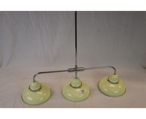 A Retro style industrial type three branch ceiling light.